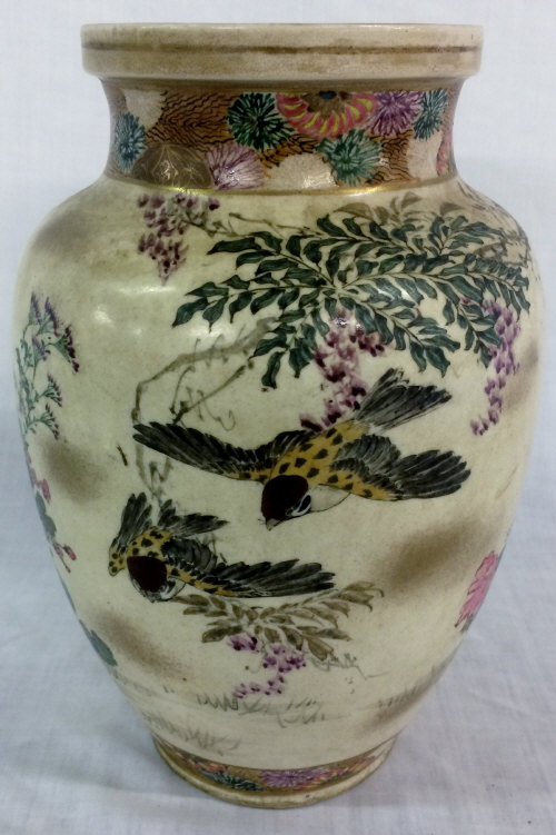 Japanese ceramic bulbus shape vase hand painted with sparrows in flight with gilded borders H.