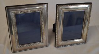 2 silver photo frames