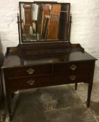 Early 20th century mahogany dressing table with swan neck handles