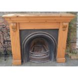 Pine fire surround with cast iron insert
