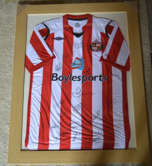 Framed Sunderland A F C signed football shirt