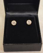 18ct gold diamond earring studs, approx 1.