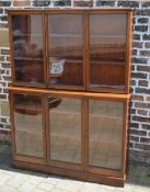 Two part mahogany glass fronted display cabinet