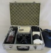 Minolta SLR 7000 camera with accessories and case