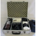 Minolta SLR 7000 camera with accessories and case