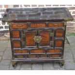 Oriental cabinet with 3 drawers over cupboard,