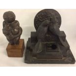 Bronze replica of Venus of Willendorf & a bronze casting of birds on a slate plinth with impressed