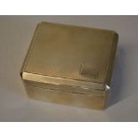 Silver cigarette box with engine turned top,