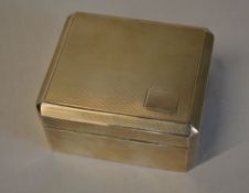 Silver cigarette box with engine turned top,