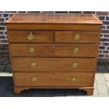 Georgian inlaid chest of drawers on bracket feet with brass plate handles