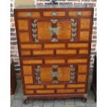 Oriental chest on chest with swan neck style handles and butterfly hinge decoration,