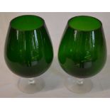 2 large green glass vases in the shape of brandy glasses