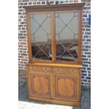 A superior mahogany display bookcase in the Chippendale style with blind fret work to the pelmet &