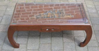 Oriental style carved coffee table