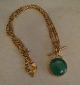 An attractive 9ct gold chain with 9ct gold and semi precious stone fob pendant with unmarked T bar,