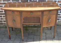 Regency mahogany bow fronted sideboard with tambour draw & ring handles on tapering legs with spade