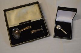 Silver Christening set (Birmingham 1958) and a silver miniature pair of shell shaped tongs (London