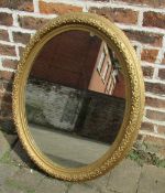 Oval mirror in gilt frame H 85 cm