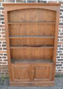 Pine bookcase with cupboard under