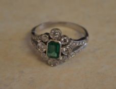 18ct gold emerald & diamond ring,