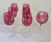 Set of 6 cranberry wine glasses (one a/f) & a brandy glass