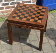 Oriental games table with chess pieces