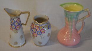 Charlotte Rhead Bursley Ware jug and vase (heavily chipped) and a Majolica 1930s jug