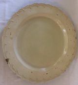 Large 18th century salt glazed charger with barbed border Dia.34cm Chip to rim.