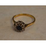 18ct gold sapphire and diamond cluster ring,