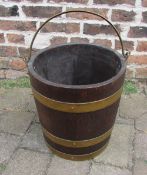 Antique oak bucket with brass handle initialled W F