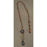 9ct gold necklace and pendant (possibly Aquamarine/Blue Topaz) approx weight 2.