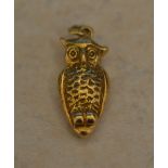 Tested as 18ct gold owl pendant, approx weight 7.