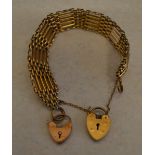9ct gold gate bracelet with 2 9ct gold padlocks,