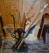 Umbrella stand with walking sticks,