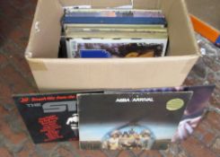 Box of assorted 33 rpm LPs inc Abba, Chris de burgh,
