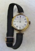 15ct gold ladies wristwatch with cloth strap