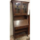 Early 20th century oak bureau bookcase with stained glass panels
