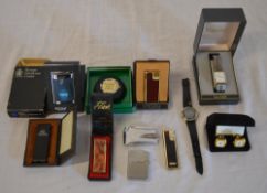 Quantity of lighters and two wristwatches