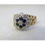 18ct gold sapphire and diamond cluster ring 0.