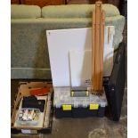 Various artists equipment including paints, small easel, folder,