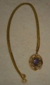 9ct gold amethyst and seed pearl pendant (some pearls missing) on an 18ct gold necklace,