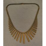 9ct gold Cleopatra style fringe necklace,