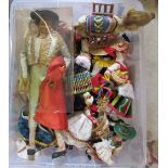 Collection of vintage tourist souvenir dolls