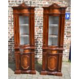 Pair of serpentine fronted corner display cabinets