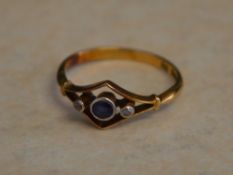 18ct gold sapphire and diamond ring in an unusual setting, approx weight 2.