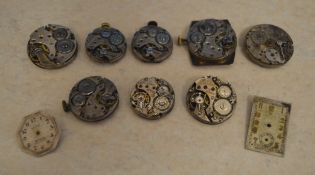 Approx 8 watch movements marked 'Rolex' and 2 dials marked 'Rolex' - for spares/repairs