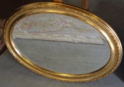 Oval gilt framed mirror