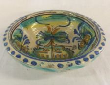 18th century stoneware bowl with polychrome decoration.