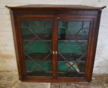 Glass fronted corner display cabinet