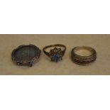 2 silver rings and a Victorian coin in a silver mount